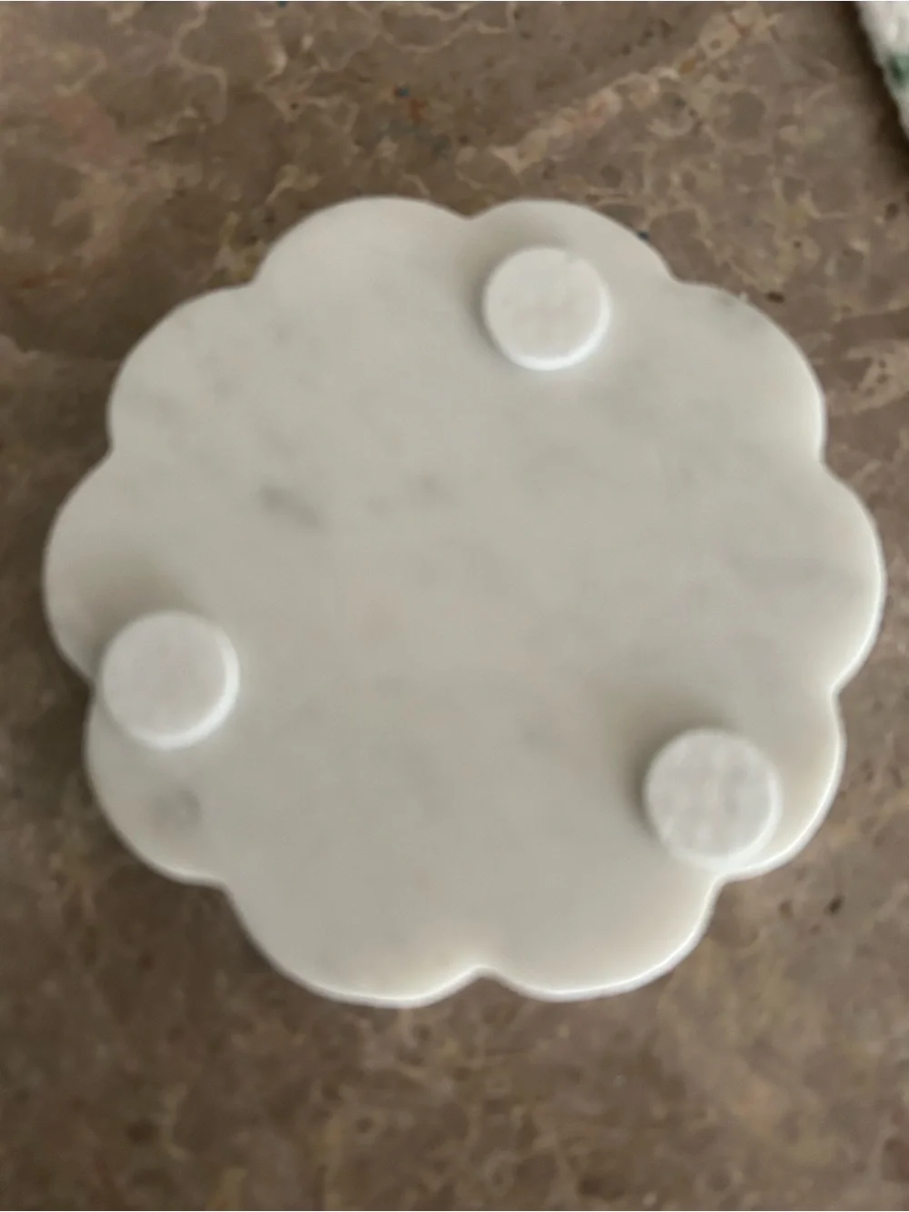 Rounded marble coasters with bottom protectors, set of four